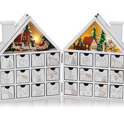 lit white wooden advent book house image 0